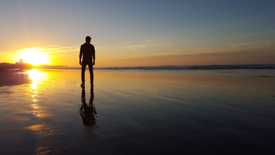 sunset over Side beach with silhouetted ruins