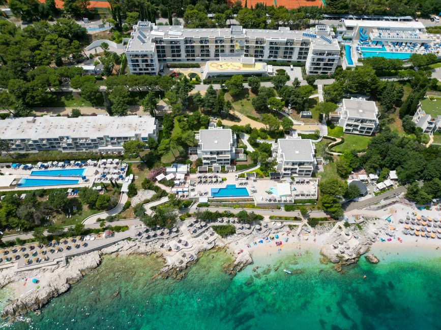 modern resort hotel pool area near the coast