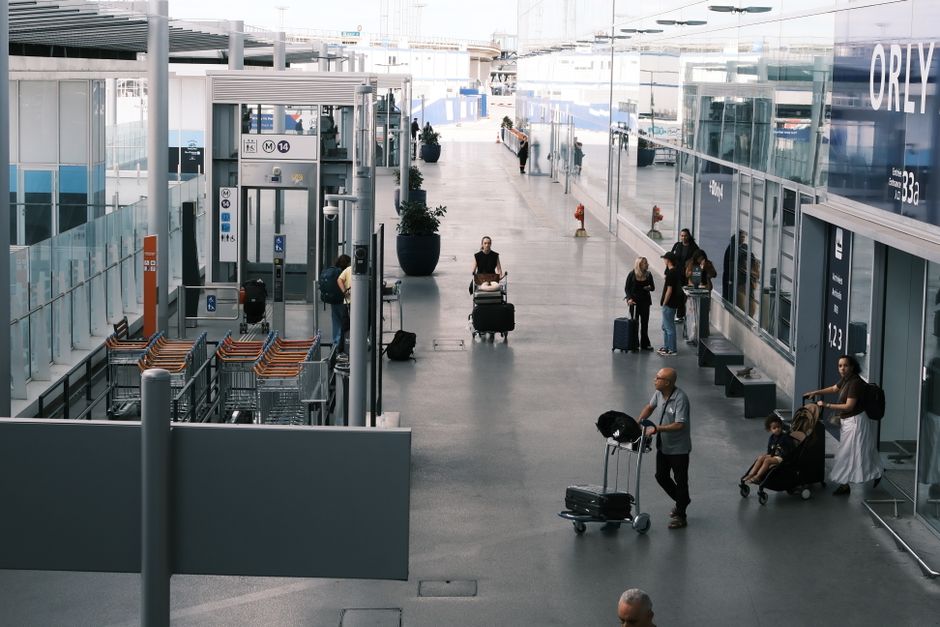 airport arrivals hall with luggage trolleys